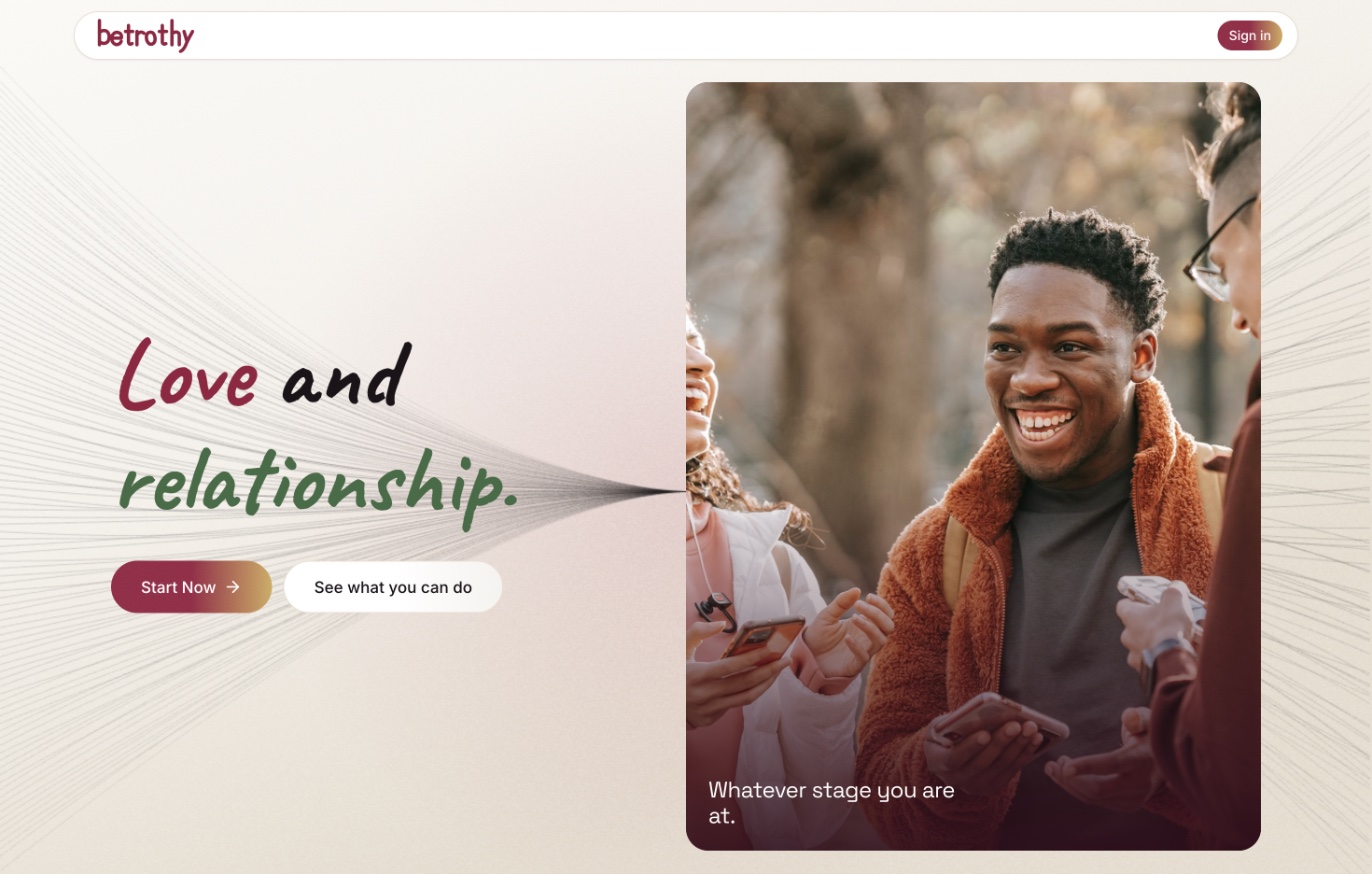 Betrothy landing page: the headline Love and relationship beside a photo of three friends laughing over their phones.